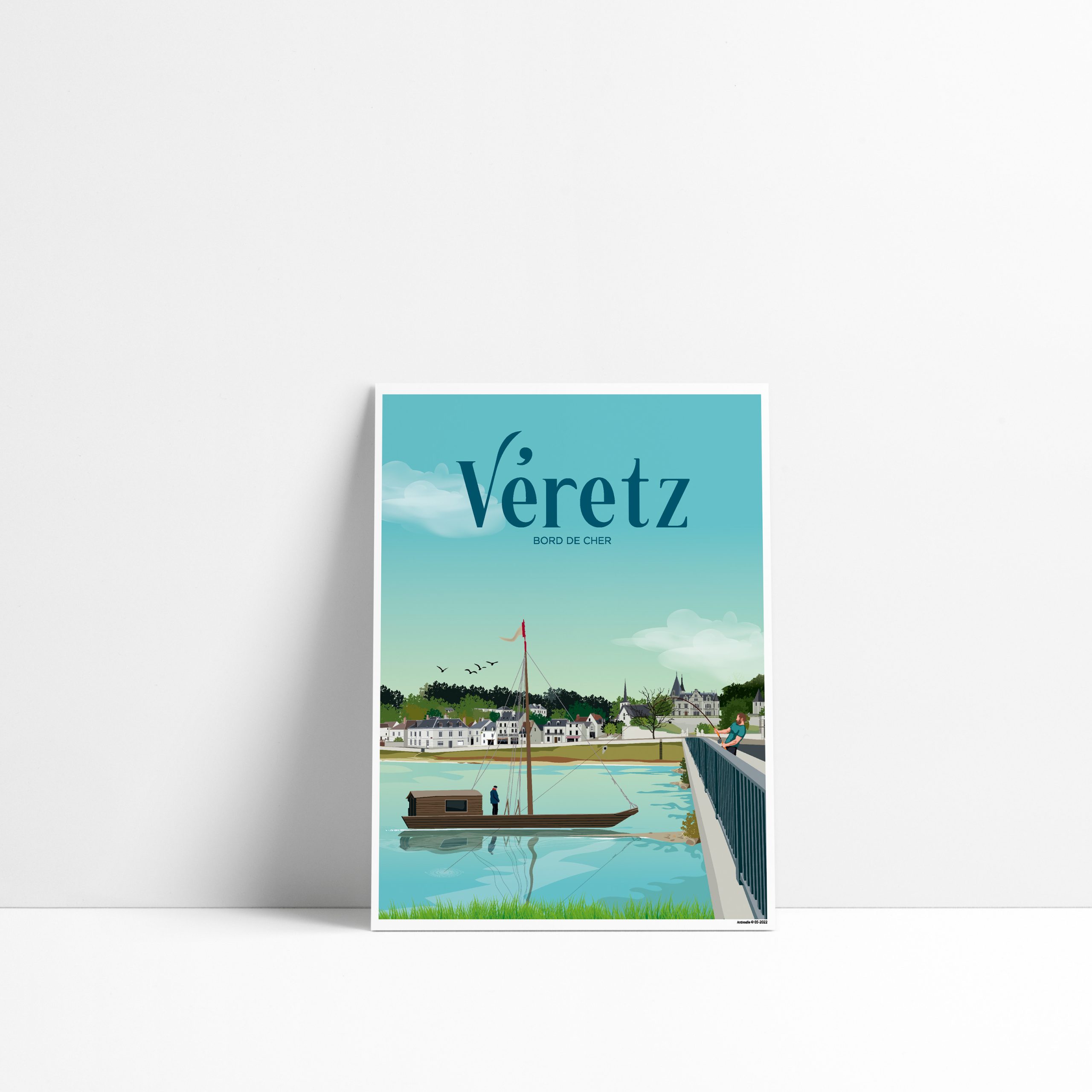 Carte postale de Véretz représentant une gabarre sur le Cher et le village au bord de l'eau